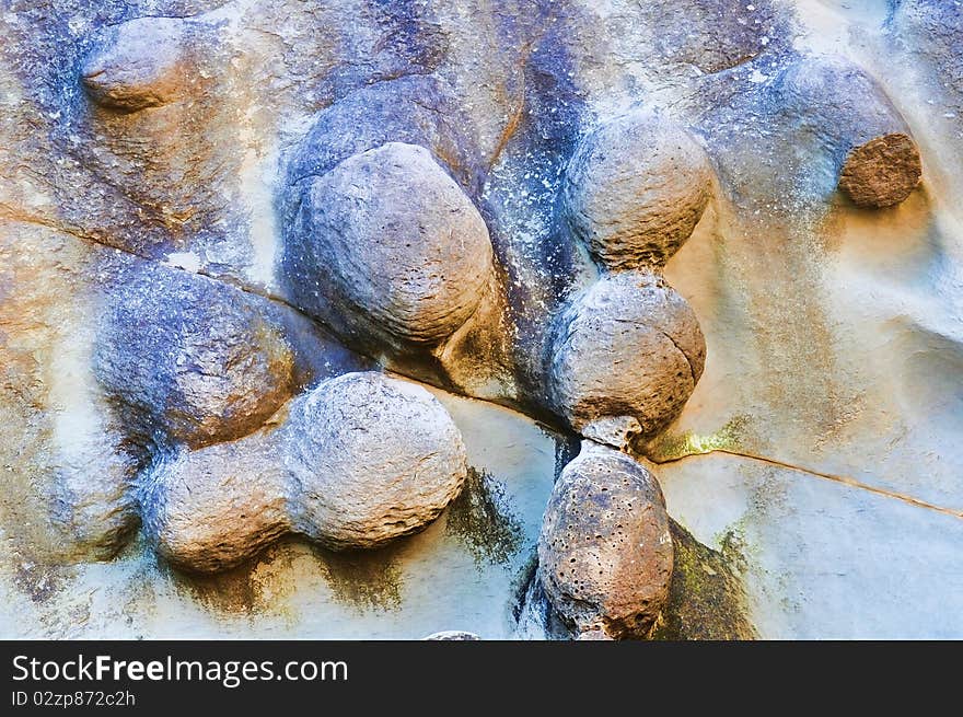 Abstract closeup of colorful eroded texture on the beach. Abstract closeup of colorful eroded texture on the beach