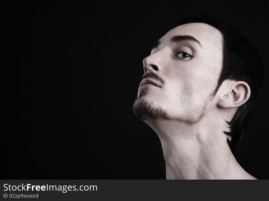 Young man's portrait. Close-up face.