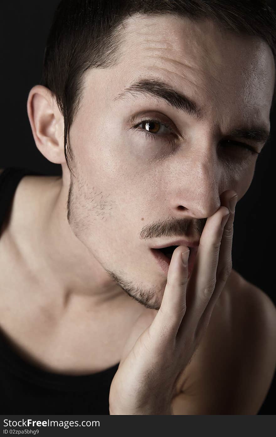 Young man's portrait. Close-up face.