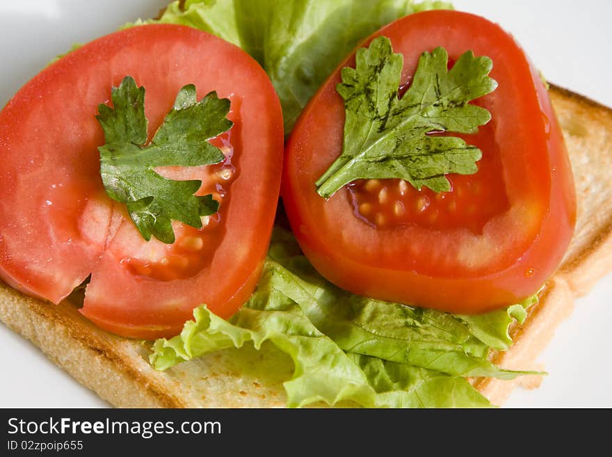 Healthy ham sandwich with tomatoes and lettuce. Healthy ham sandwich with tomatoes and lettuce