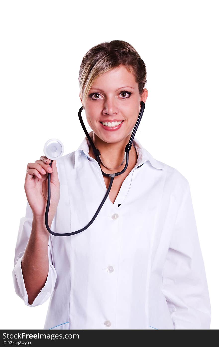 Close-up of a female doctor smiling with stethoscope. Woman Doctor At The Hospital. Close-up of a female doctor smiling with stethoscope. Woman Doctor At The Hospital