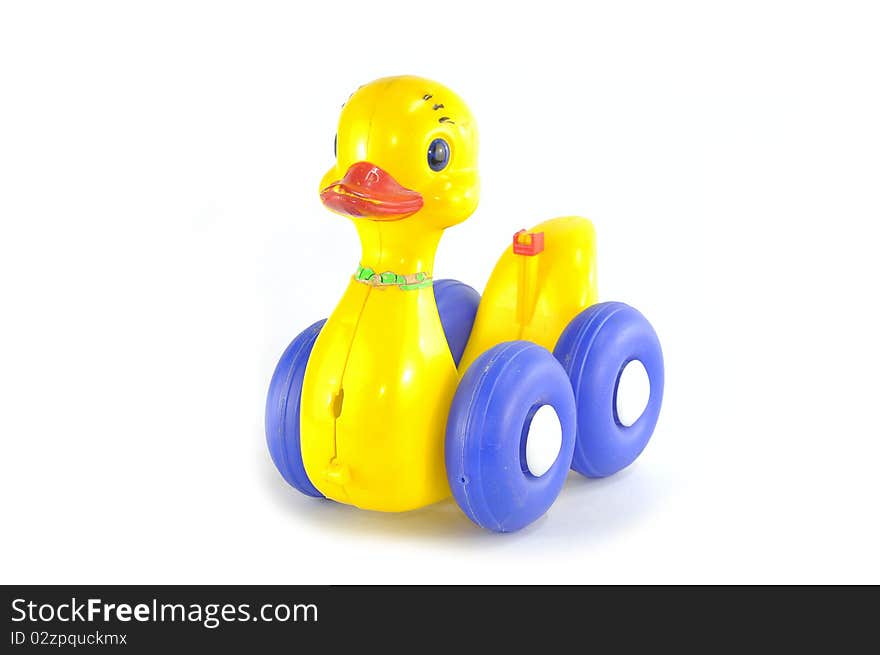 Old yellow duck toy on white background. Old yellow duck toy on white background