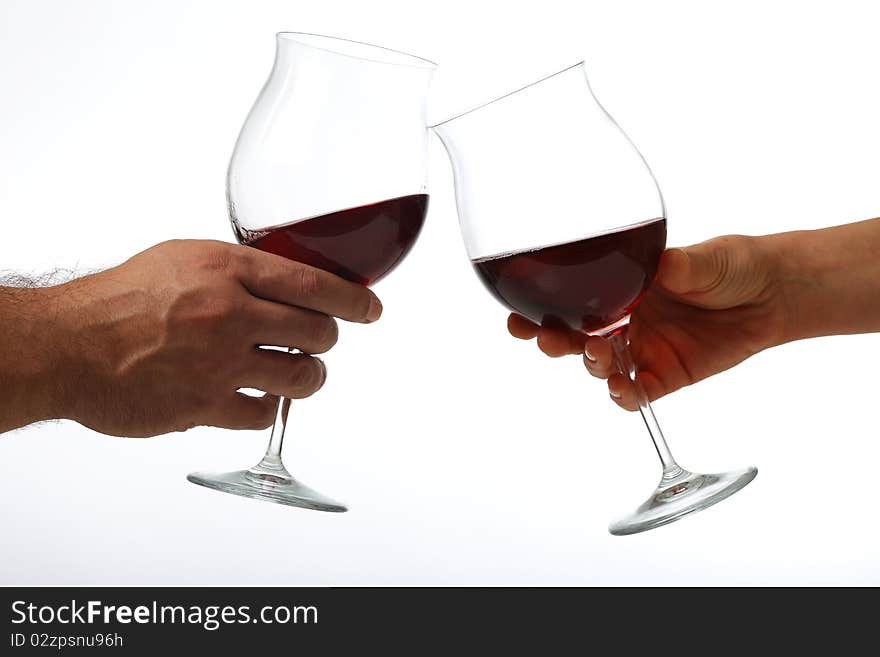 Man and woman toasting glasses of wine