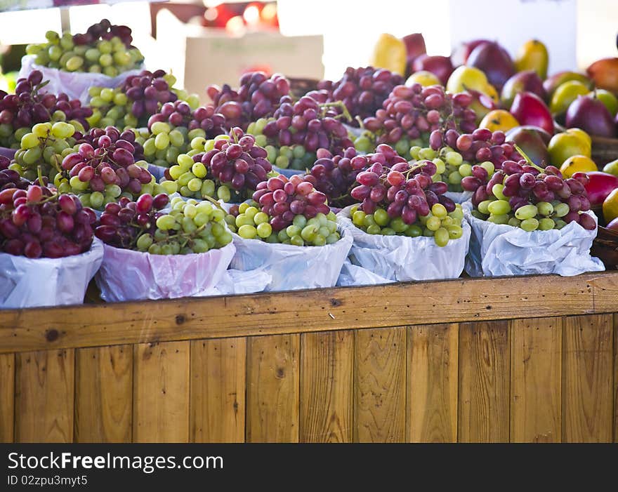 Fruits and vegetables neing exposed in a market. Fruits and vegetables neing exposed in a market