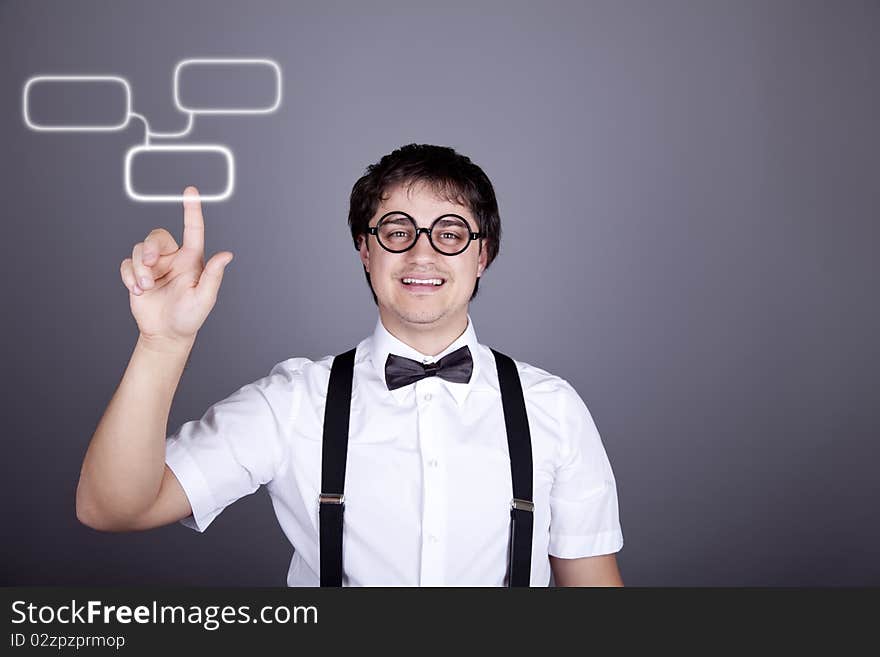 Portrait of funny fashion men in suspender with bow tie and glasses show visual plate. Studio shot. Portrait of funny fashion men in suspender with bow tie and glasses show visual plate. Studio shot.