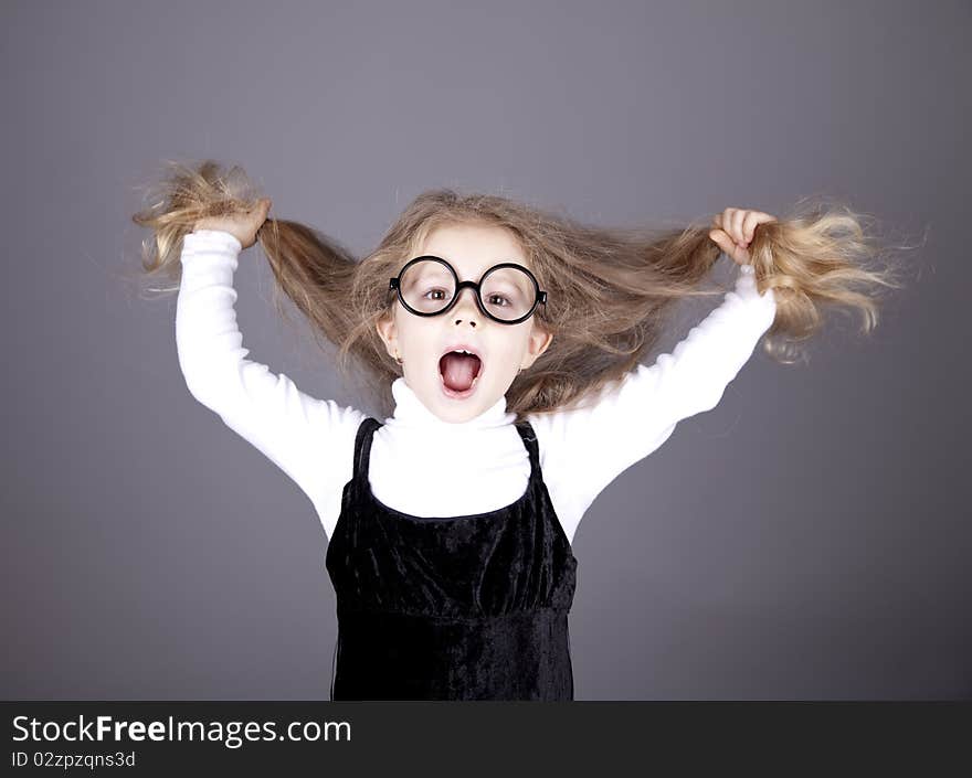 Little girl with long hair.