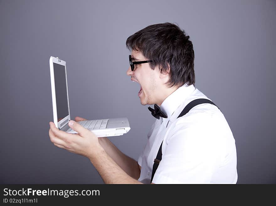 Men in suspender with notebook.