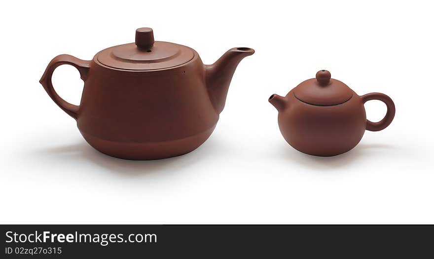 Clay teapots isolated on white background