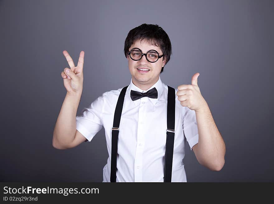 Portrait of funny fashion men in suspender