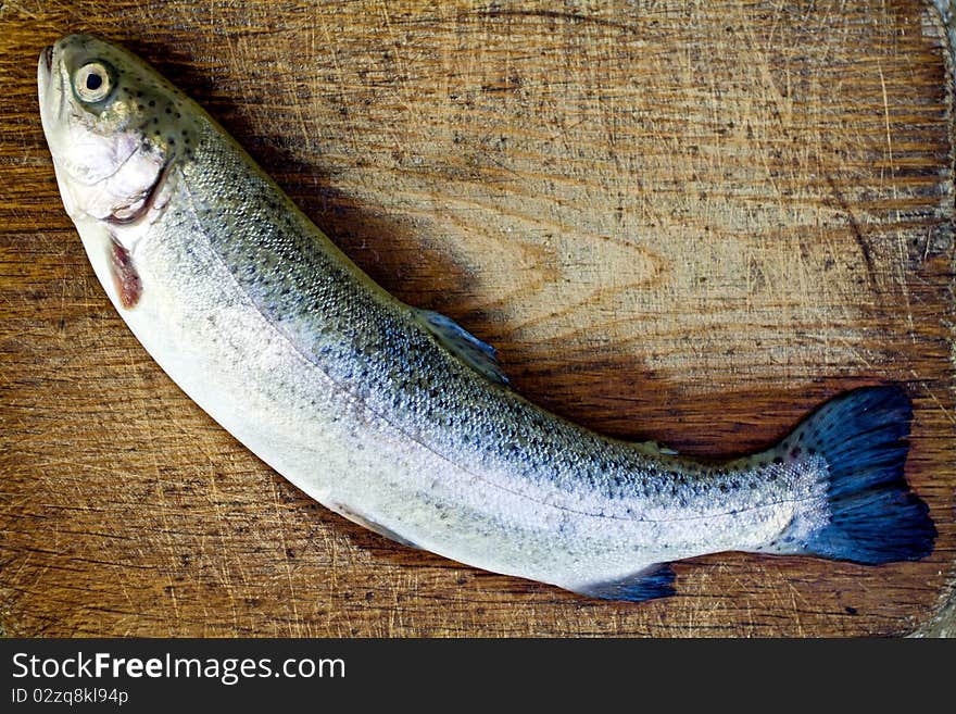 Preparing trout fish