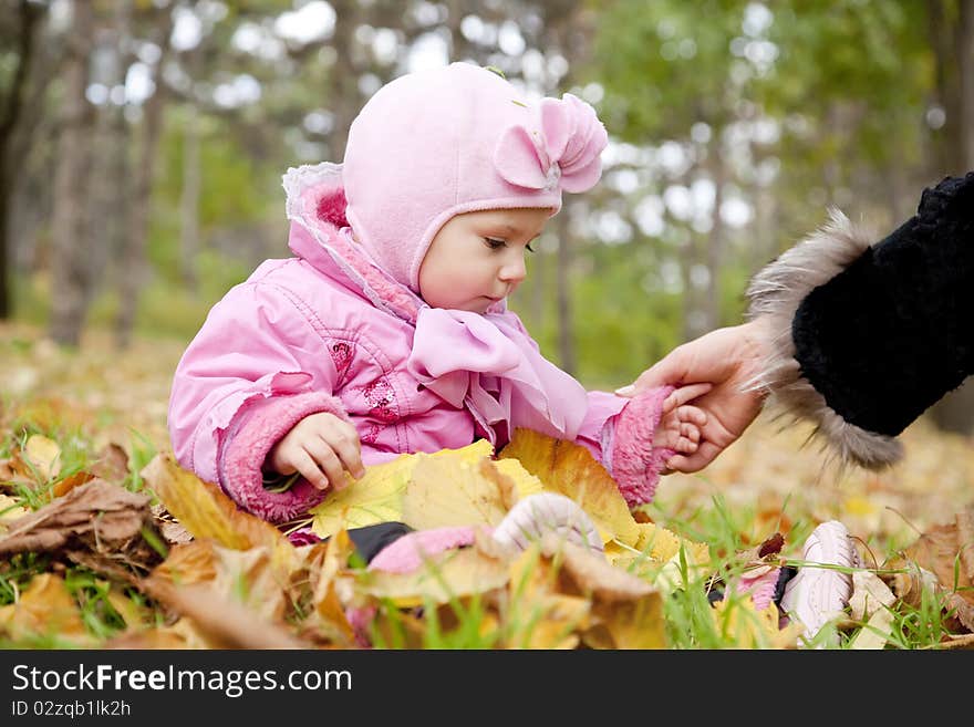 Little child in the park. Outdoor shot.