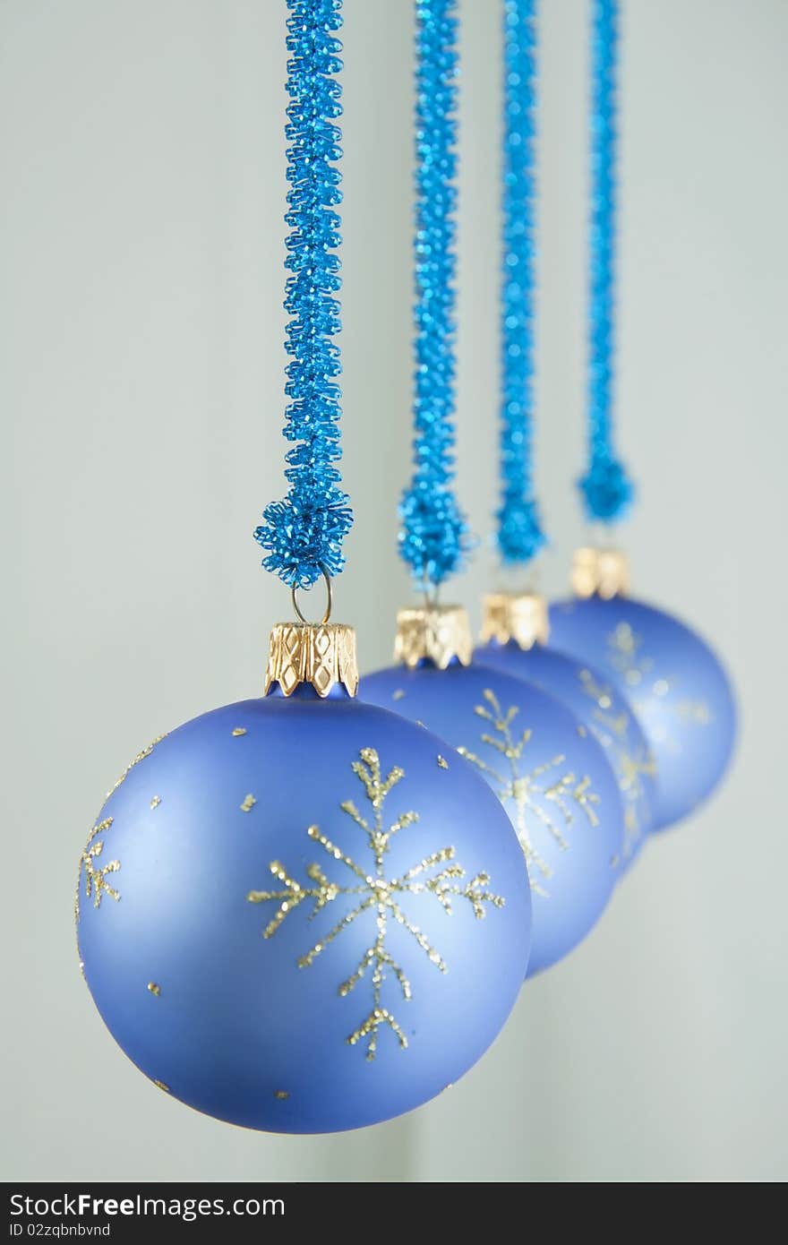 Glass spheres for an ornament hang on blue a background