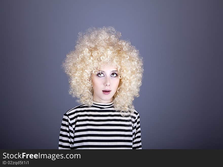 Portrait Of Funny Girl In Blonde Wig.