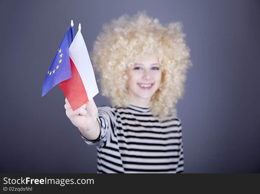 Girl with European Union and Poland flag.