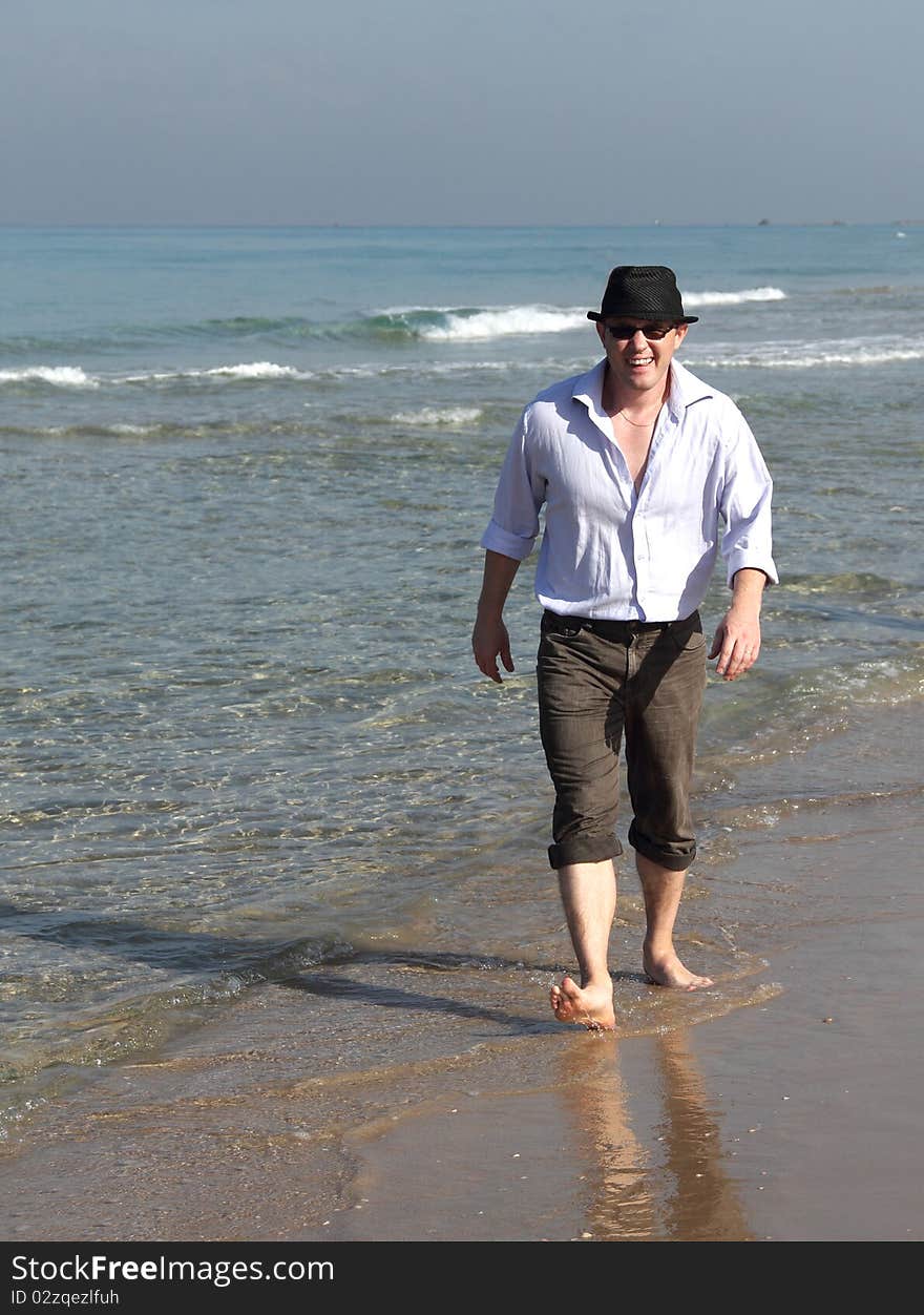 Man enjoying a beautiful seascape. Man enjoying a beautiful seascape