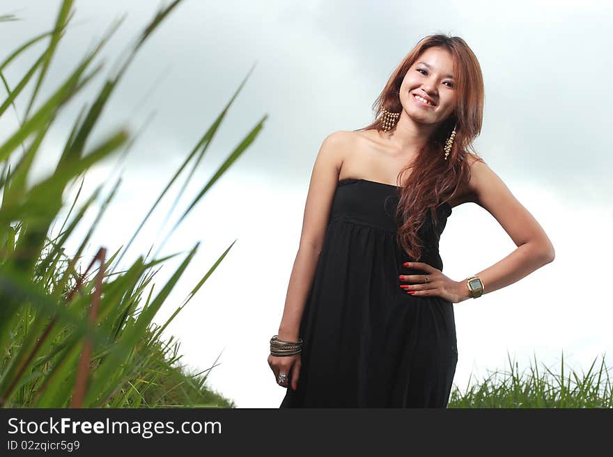 Young Beautiful Woman Smiling Outdoor