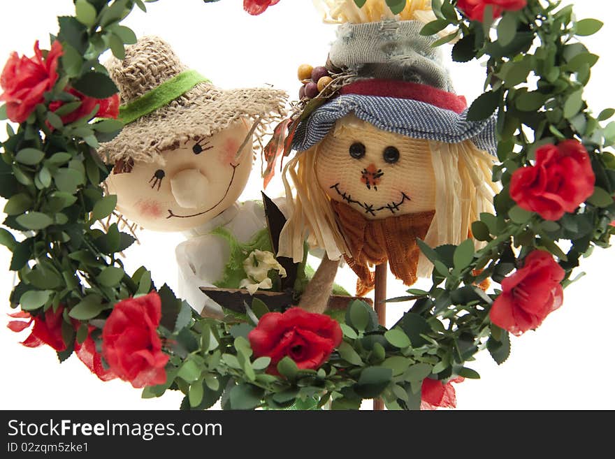 Straw dolls with roses