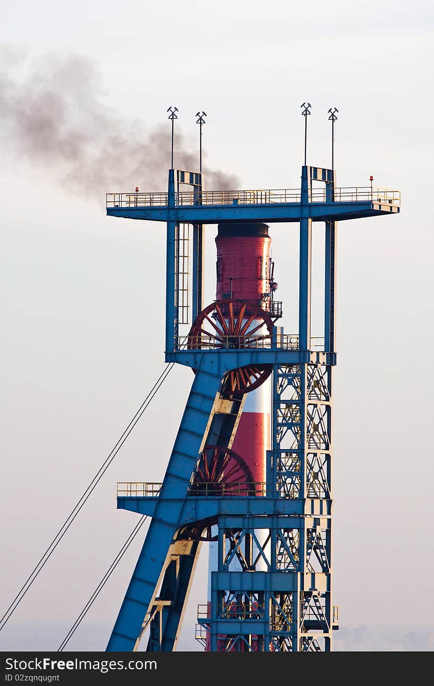 The smoking chimney of the mine shaft