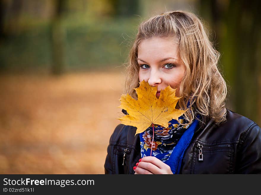 Girl In Autumn Park