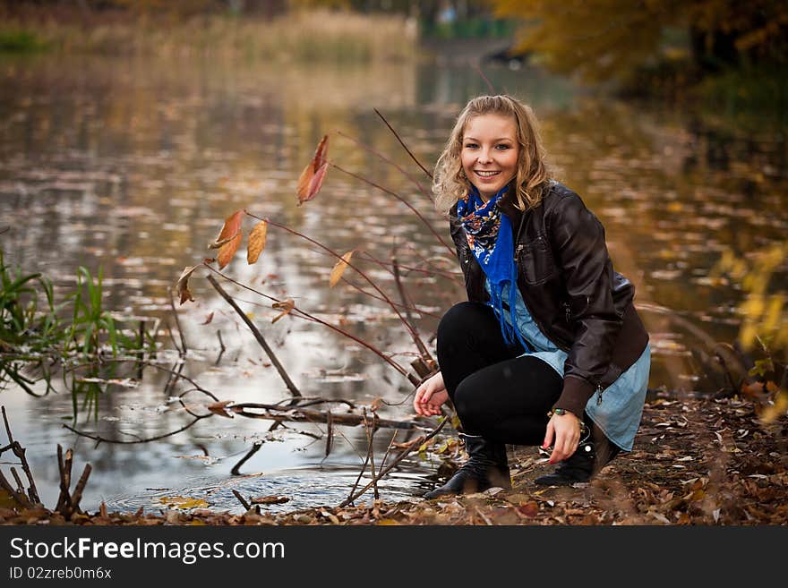 Girl In Autumn Park