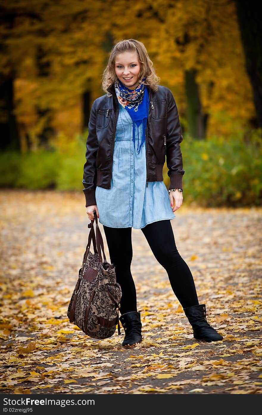 Girl In Autumn Park