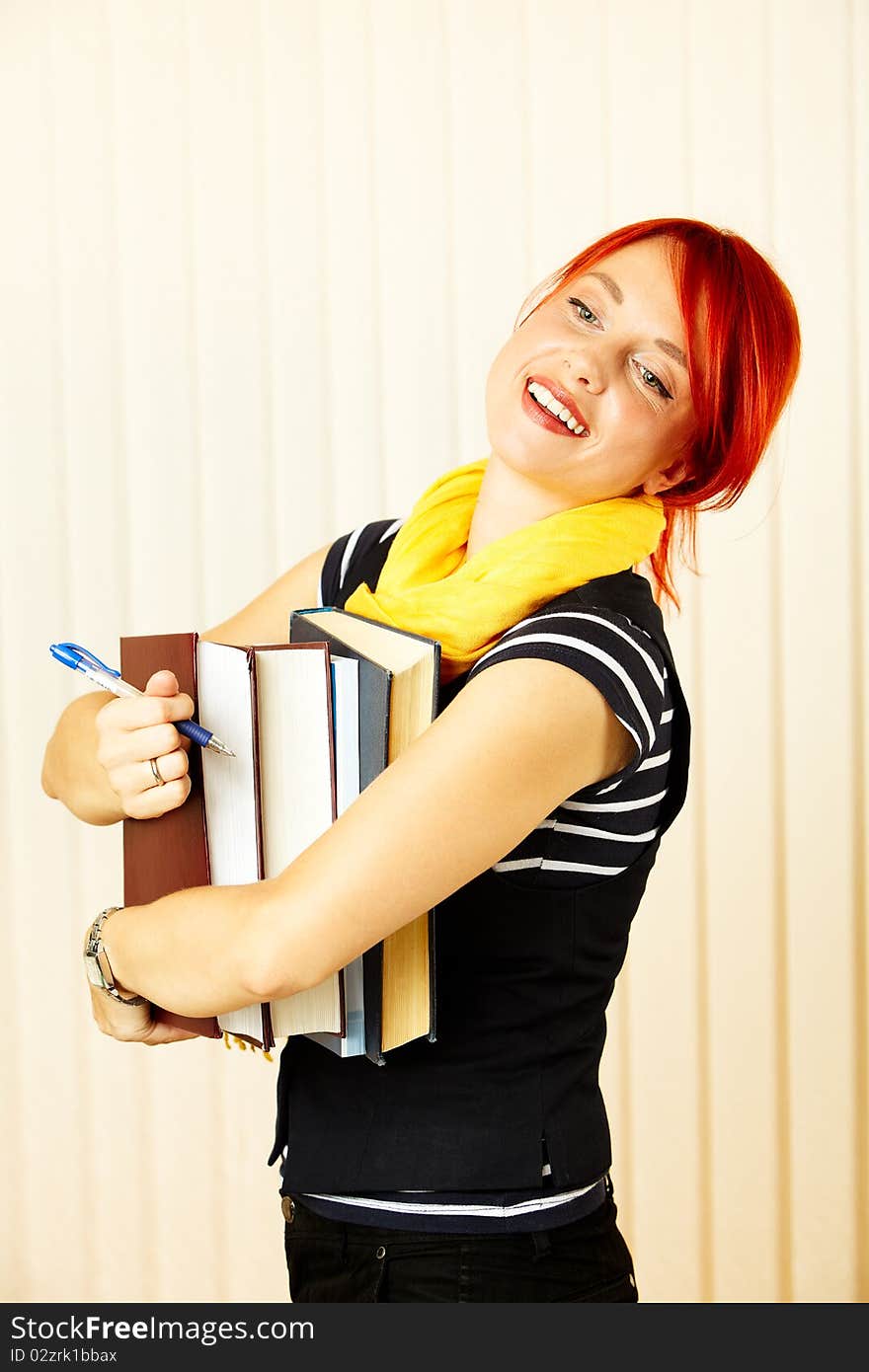 Beautiful caucasian female student with books. Beautiful caucasian female student with books