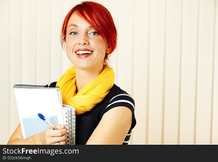 Beautiful caucasian female student with books. Beautiful caucasian female student with books