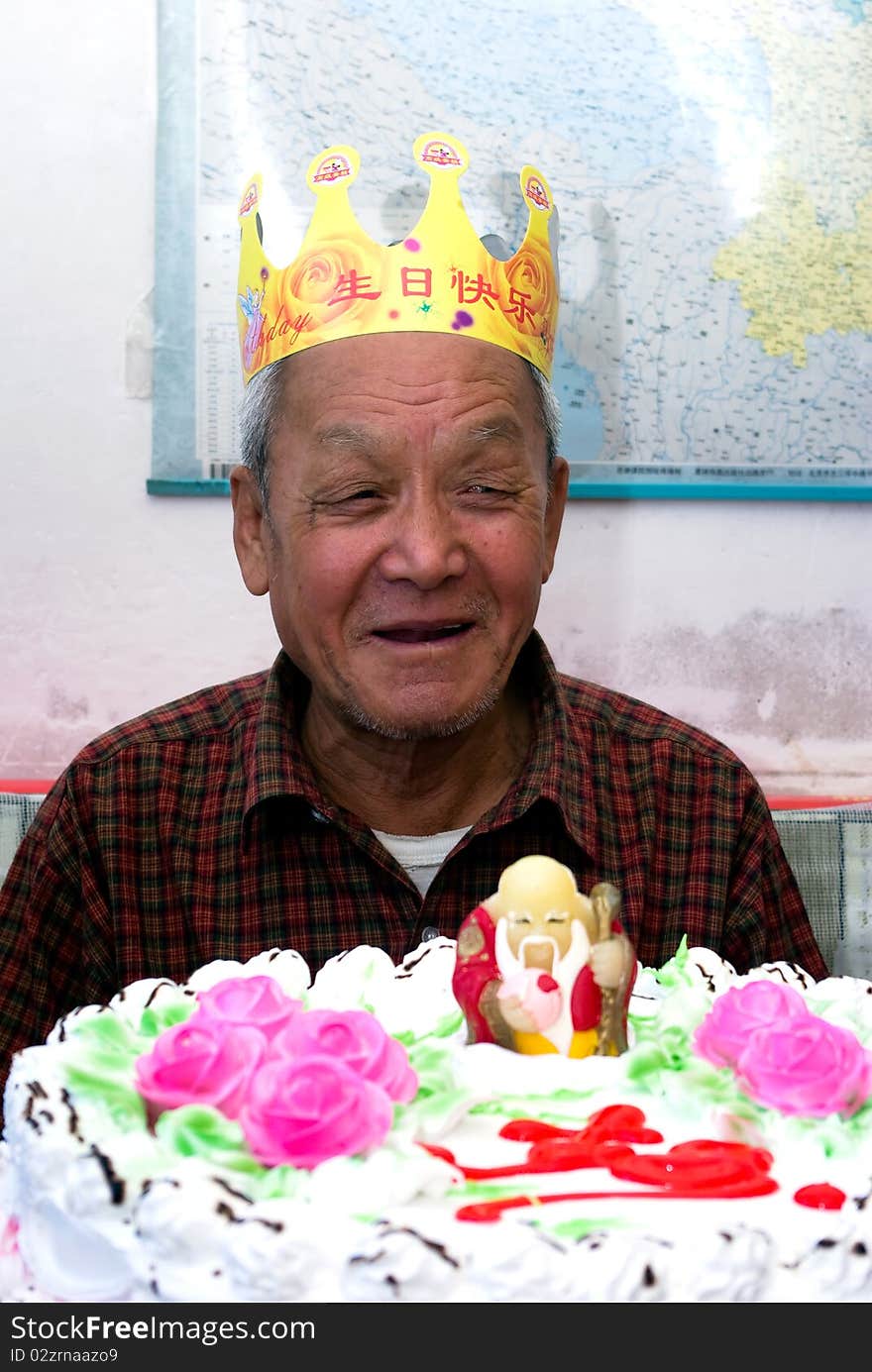 An old man's birth with birthday cake. An old man's birth with birthday cake