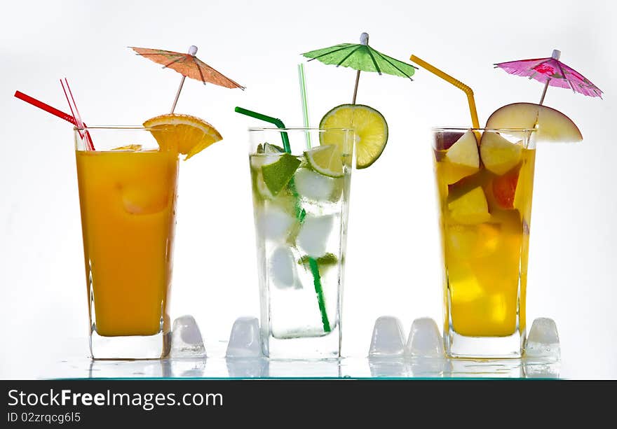 Drinks and fruits on white background