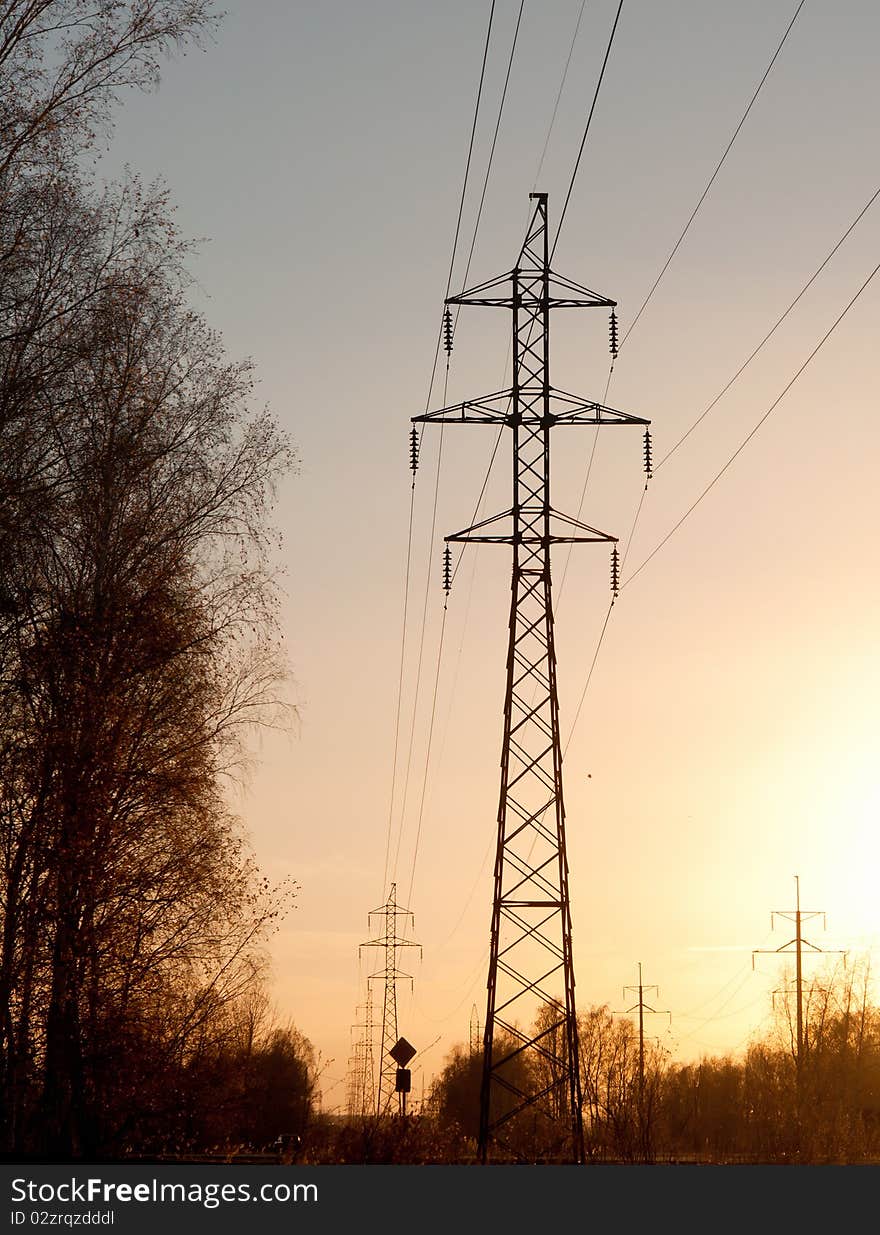 Silhouette electricity pylons at sunset. Silhouette electricity pylons at sunset.