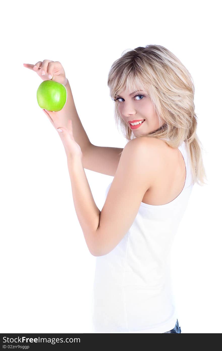 Young girl over white background with apple. Young girl over white background with apple