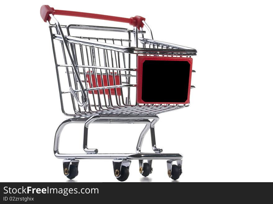 Empty shopping cart with the red handle on a white background.