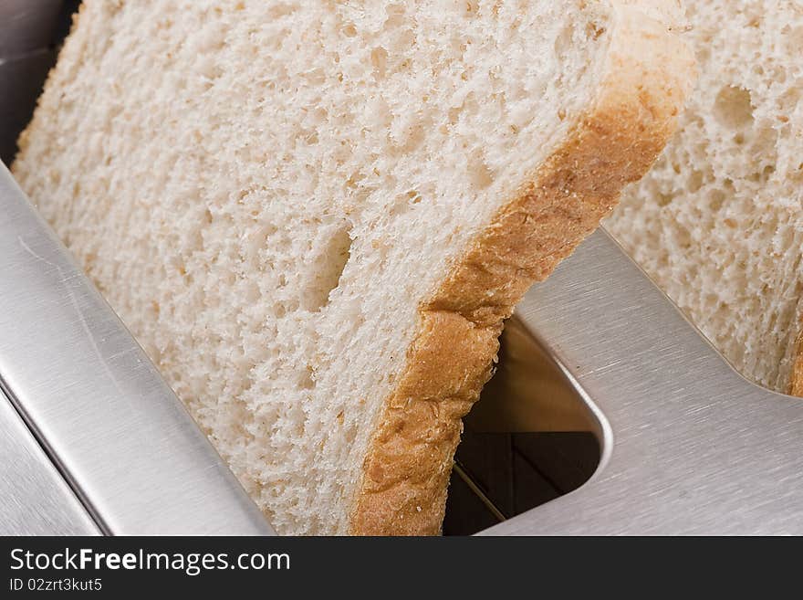 A toaster and a special bread for toast.