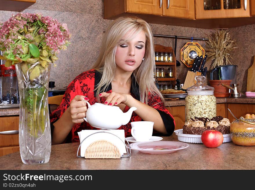 Woman breakfast with apple and cup of hot drink