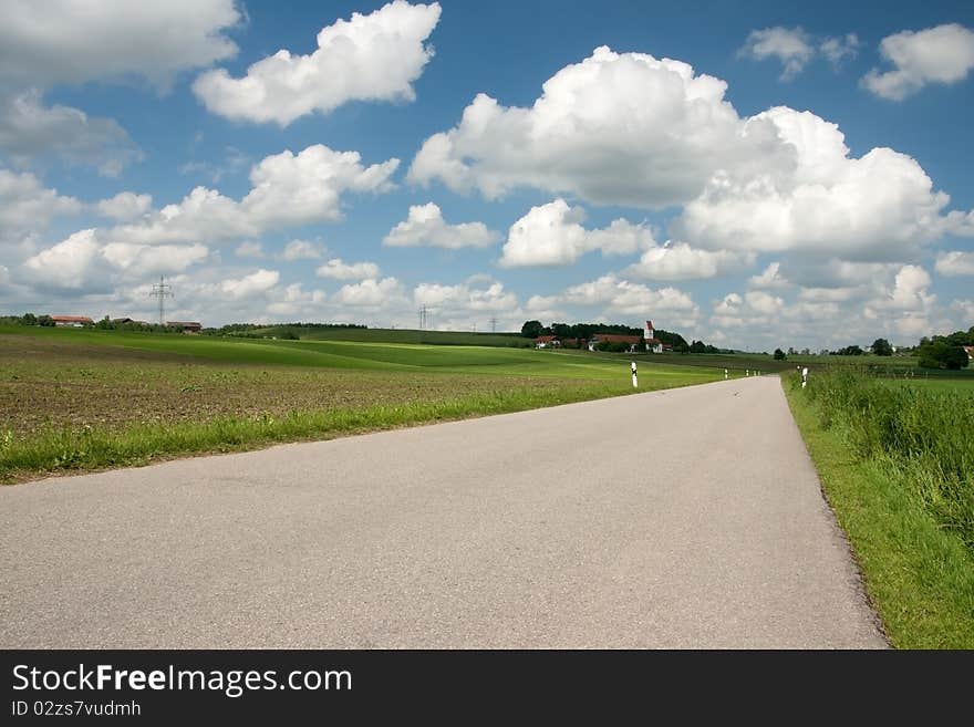 Spring landscape with country road in Bavaria