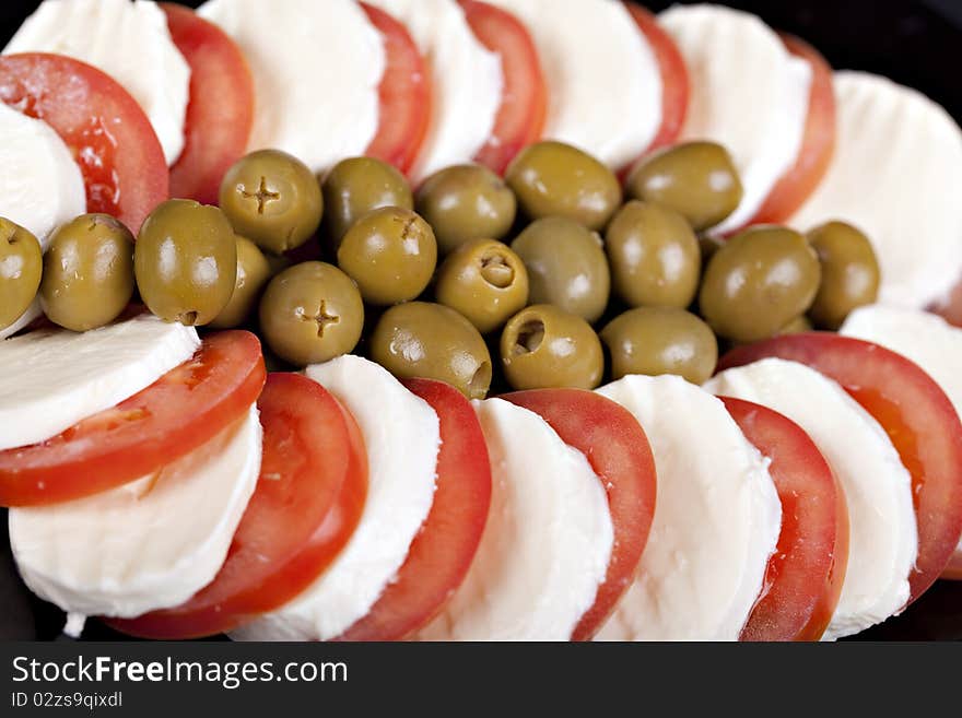 Mozzarella, tomatoes and olives