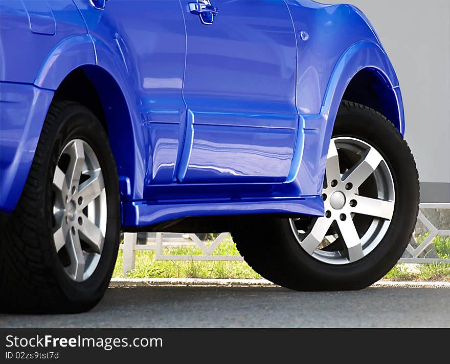 Wheels of the automobile are photographed close-up. Wheels of the automobile are photographed close-up