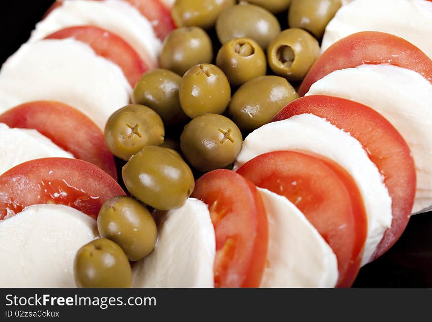 Mozzarella, tomatoes and olives