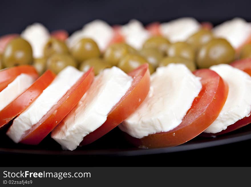 Mozzarella, tomatoes and olives