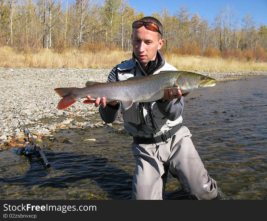 Fishing - fisherman catch big fish