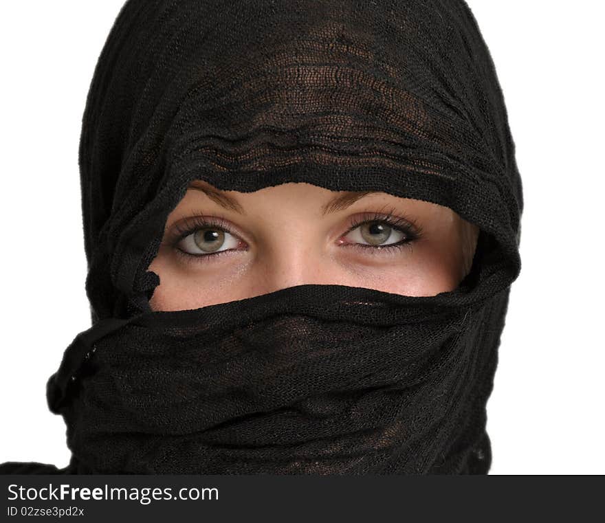 Young woman wearing a black scarf. Young woman wearing a black scarf.