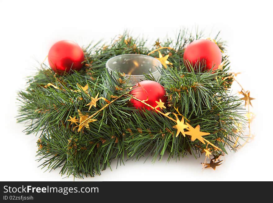 Christmas wreaths with christmas toys on the white background