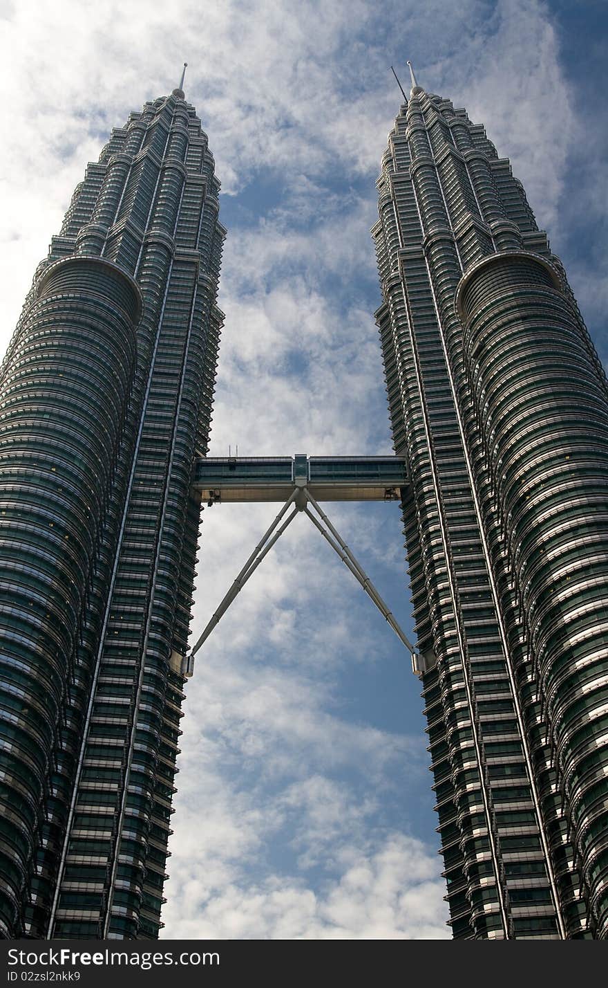 Centre view of Petronas Towers Portrait with blue sky background