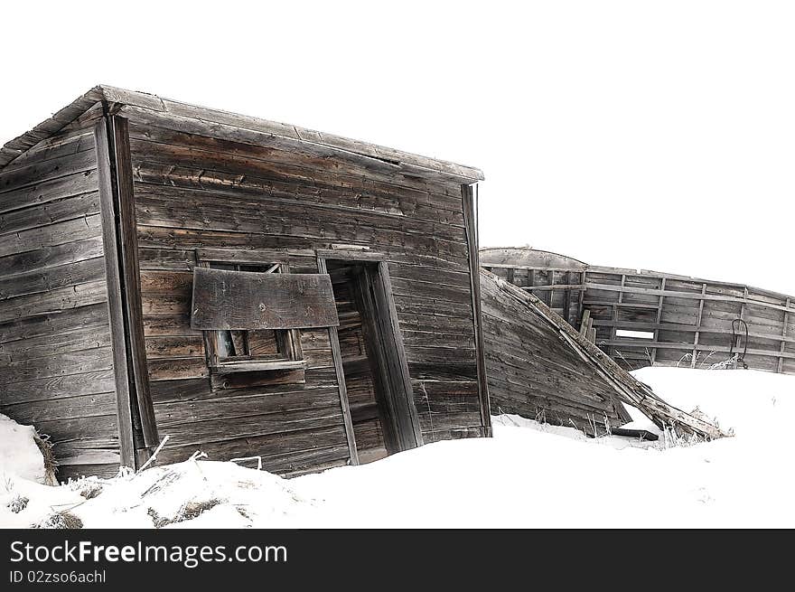 Old, abandoned farm building in winter. Old, abandoned farm building in winter