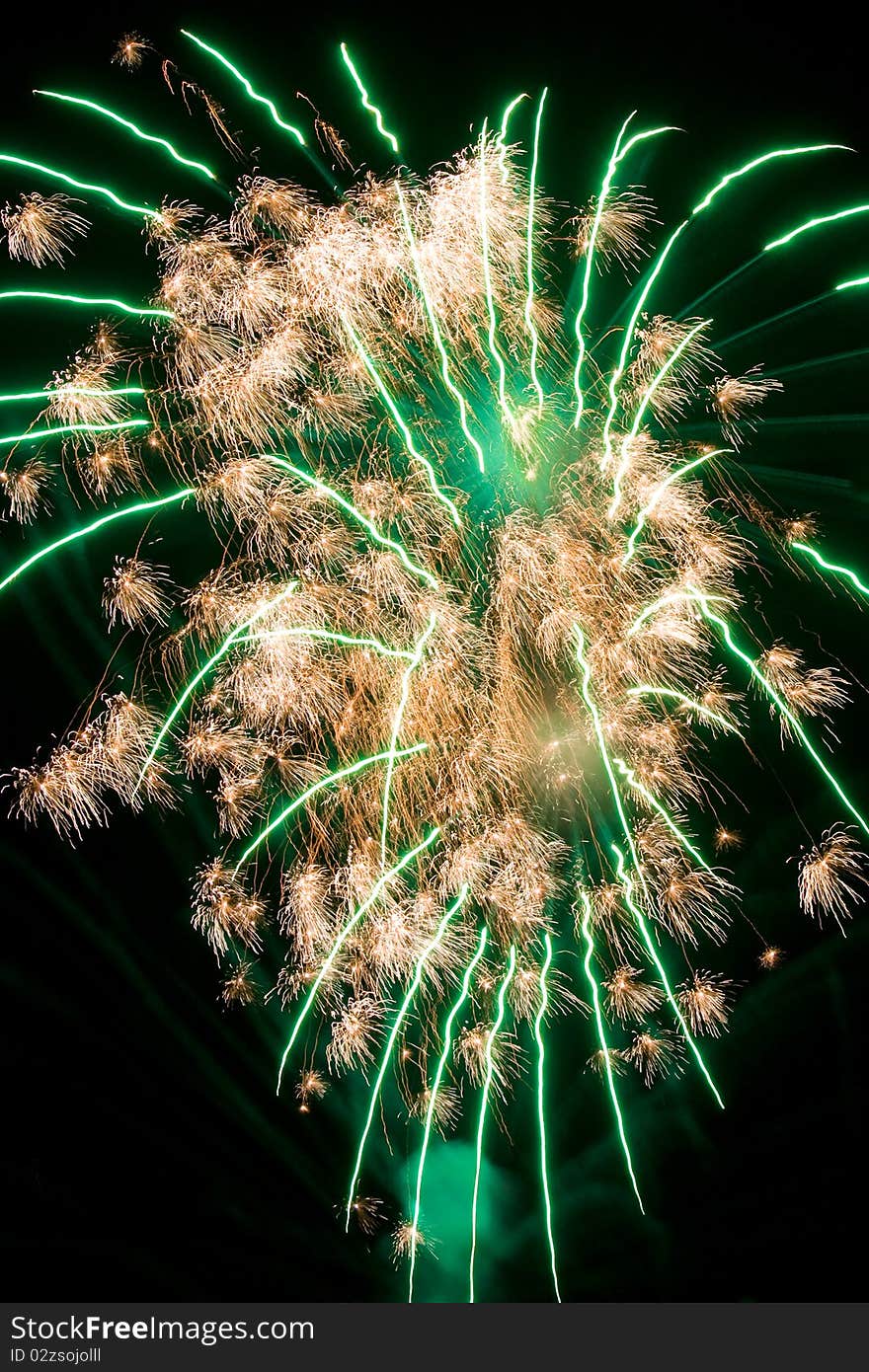 Brightly coloured fireworks against a black night sky