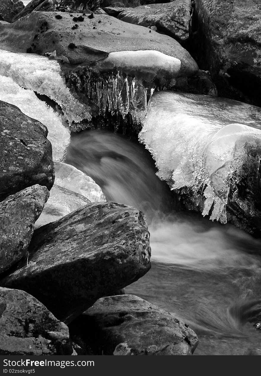 Abstract ice crystals on a shallow stream. Abstract ice crystals on a shallow stream