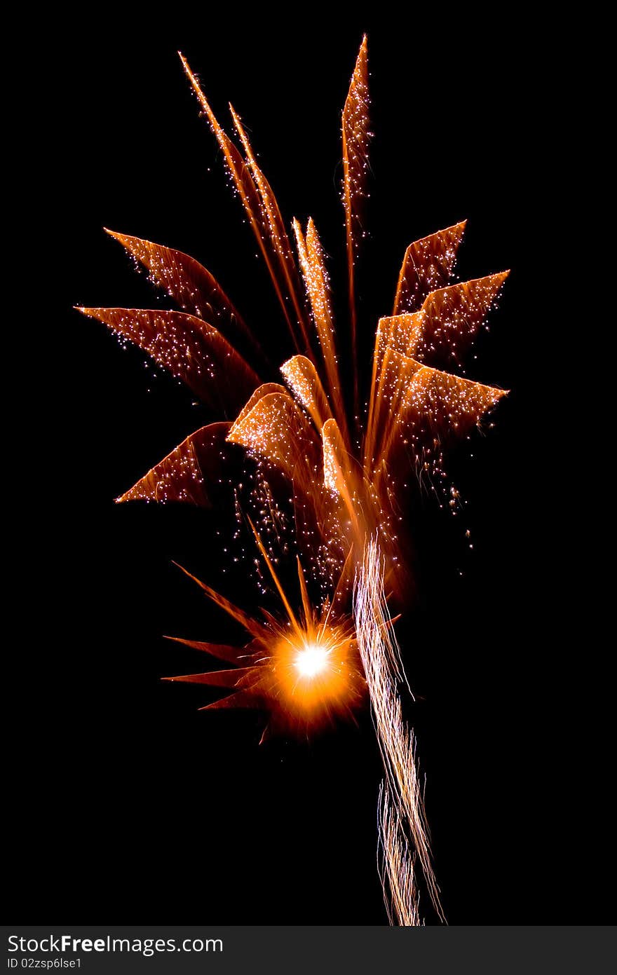 Brightly coloured fireworks against a black night sky