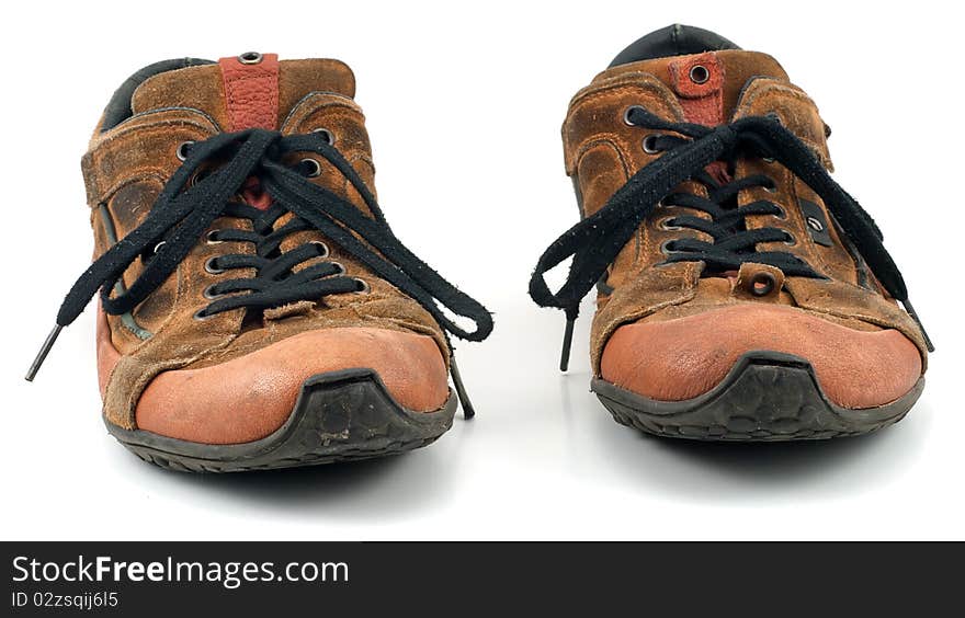 Studio shot of old sneakers on white background. Studio shot of old sneakers on white background