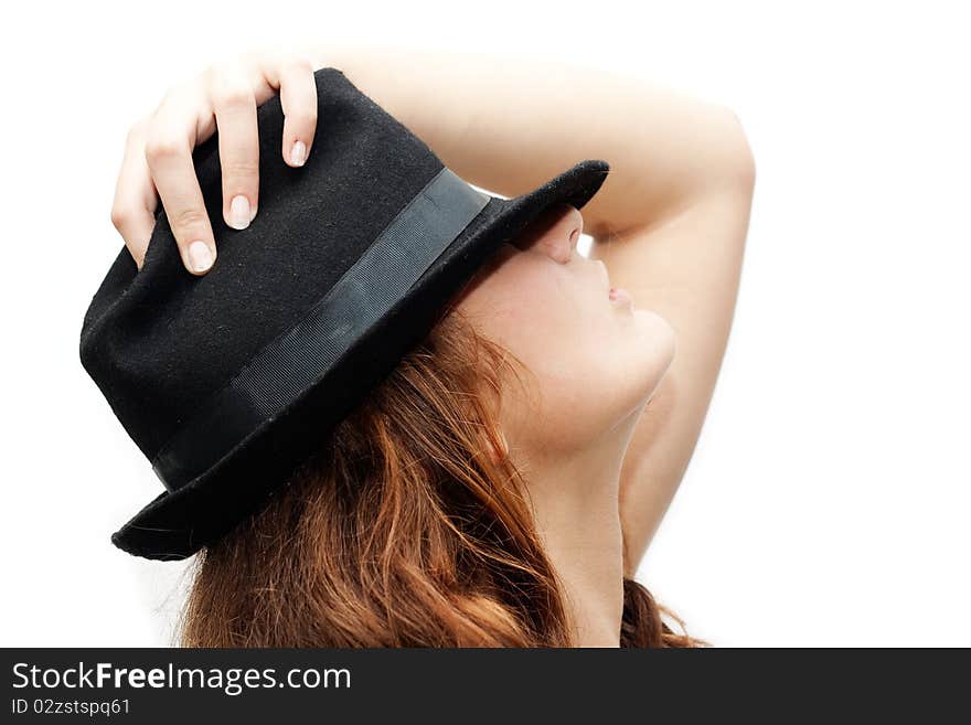 Elegant girl in a black hat isolated on white background. Elegant girl in a black hat isolated on white background