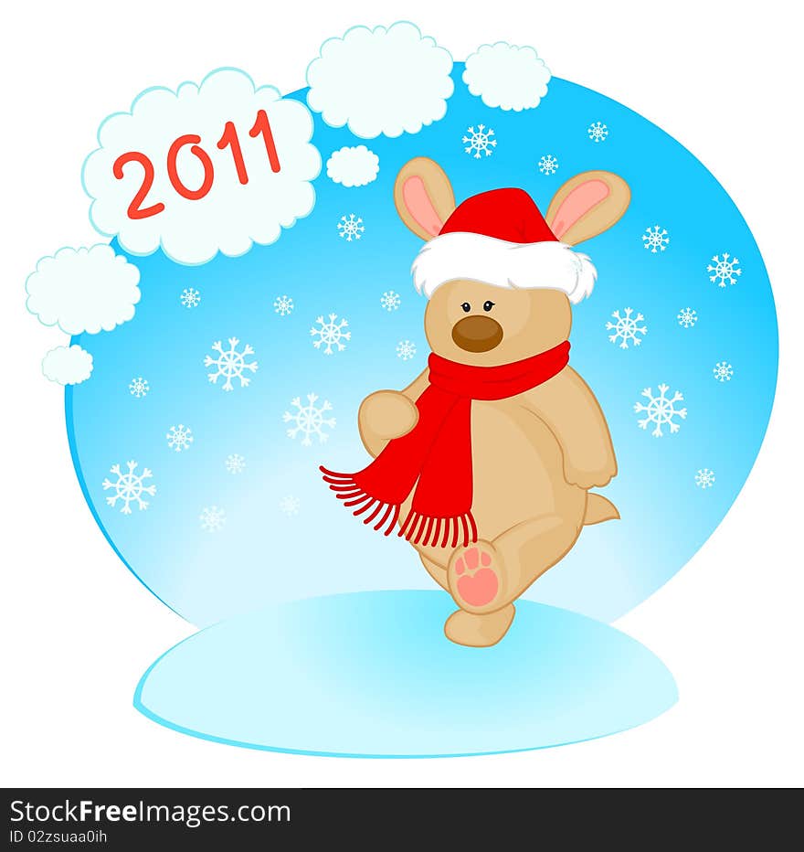 Cartoon little toy bunny in the cap of Santa Claus